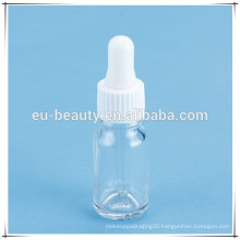 Clear Boston round bottle with White top dropper